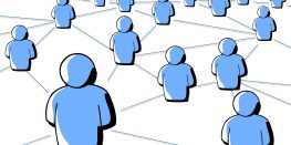 Illustration of multiple blue figures connected by lines on a white background.